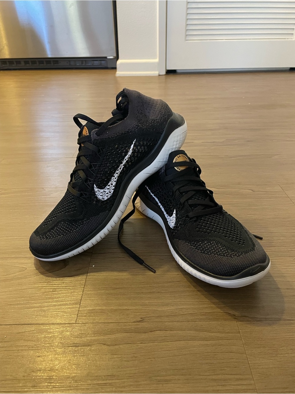 Nike Black and White Women's Free Run Flyknit Running Shoes